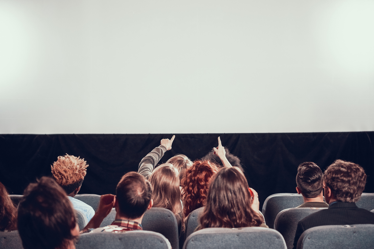 Film screening in cinema. Viewing new movie. Film screening.