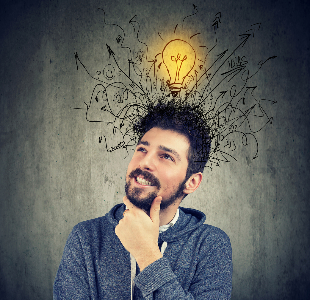 young man has a bright idea / SIphotography young happy man has a bright idea