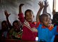 A group of primarty school children participate in a class in Enchoro, Western Kenya on 19th February, 2009. Mary's Meals, a Scottish NGO, alongwith Tescoes supermarket sponsor each child at the school to have one good meal a day. 